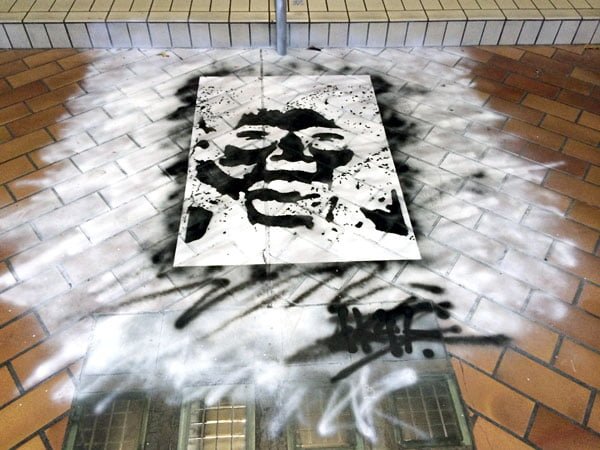 Eminent Takeover - Street Art Face on Floor