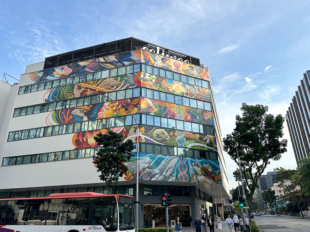 Large colourful mural on side of building