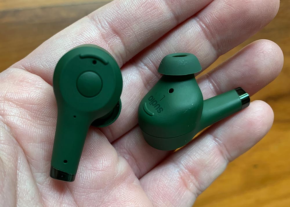 Sudio Ett earbuds in my hand to give you a sense of size