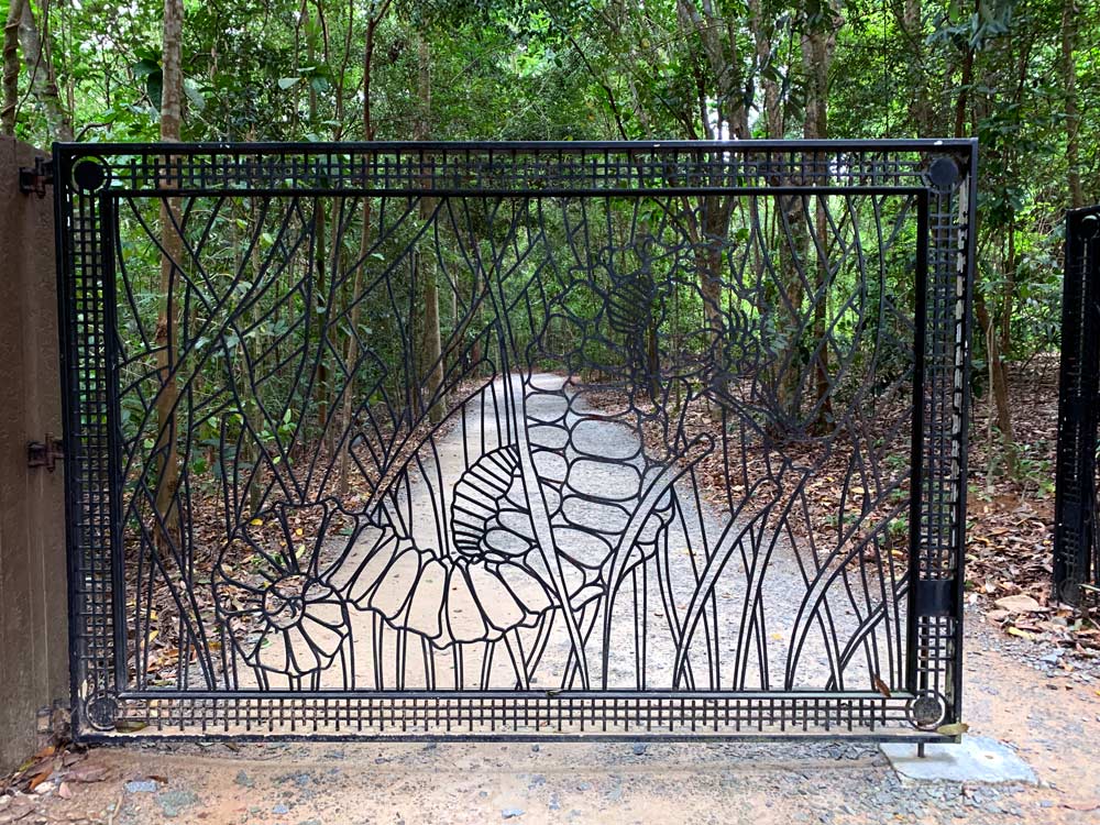 A seahorse motif worked into the iron grills of the gate at Chek Jawa