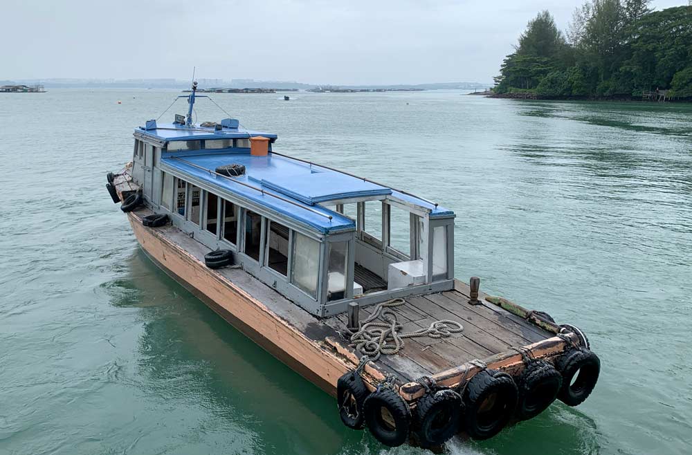 Small bumboats that sit 12pax maximum ferry visitors to and from Pulau Ubin