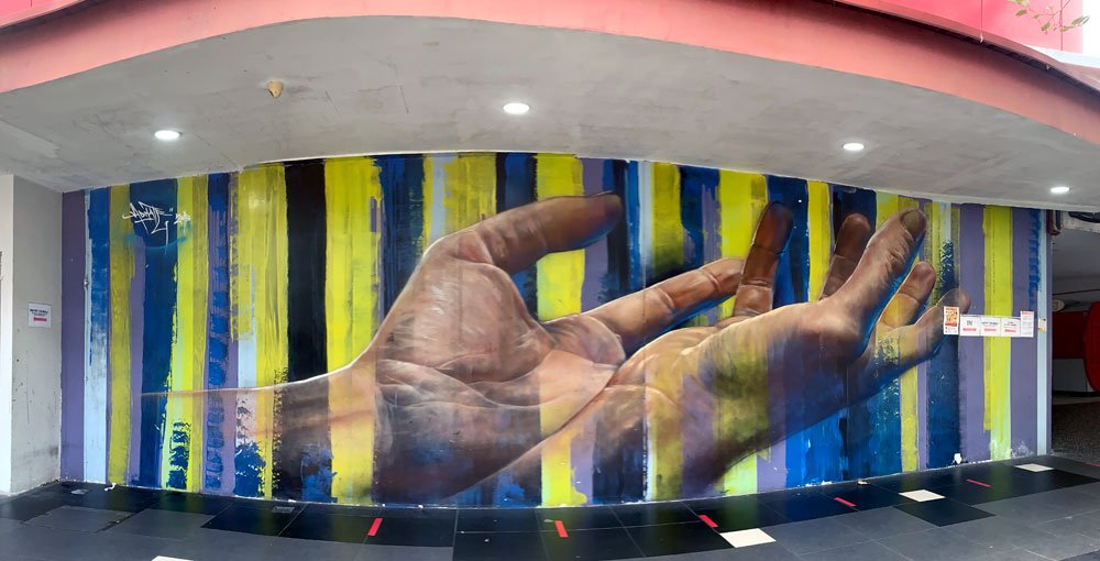 AdNate depicted a very realistic pair of hands that seem to be asking for something