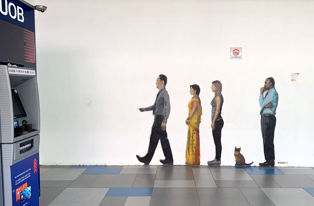 Trase's work sees 4 people and a cat lined up as if to use the ATM. The person right in front looks a lot like Lee Kuan Yew...