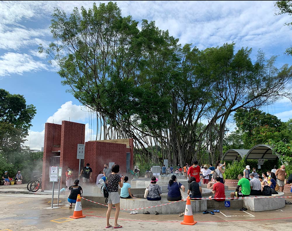 Lots of people vying for a seat at the lowest level of the foot bath pool