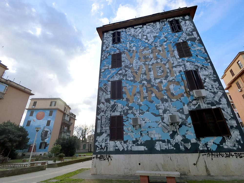 Veni Vidi Vinci, a mural by street artists Lek and Sowat on the side of a building in Tor Marancia