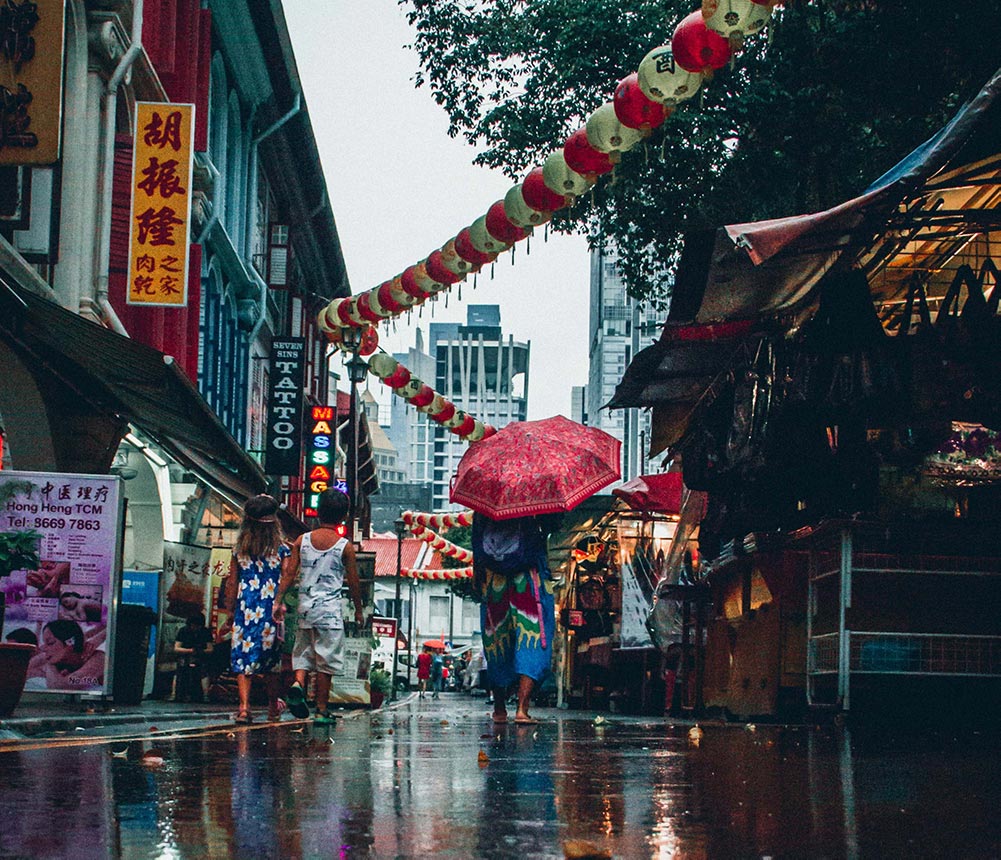 Singapore's Chinatown in the rain. Photo by Lily Banse (Unsplash)