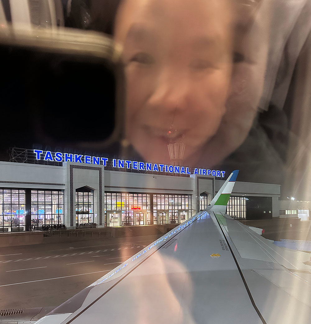 Uzbekistan Airways Window Reflection Tashkent Airport